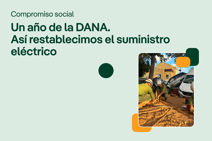 Image showing workers repairing the electrical supply after a flood, with a building in the background.