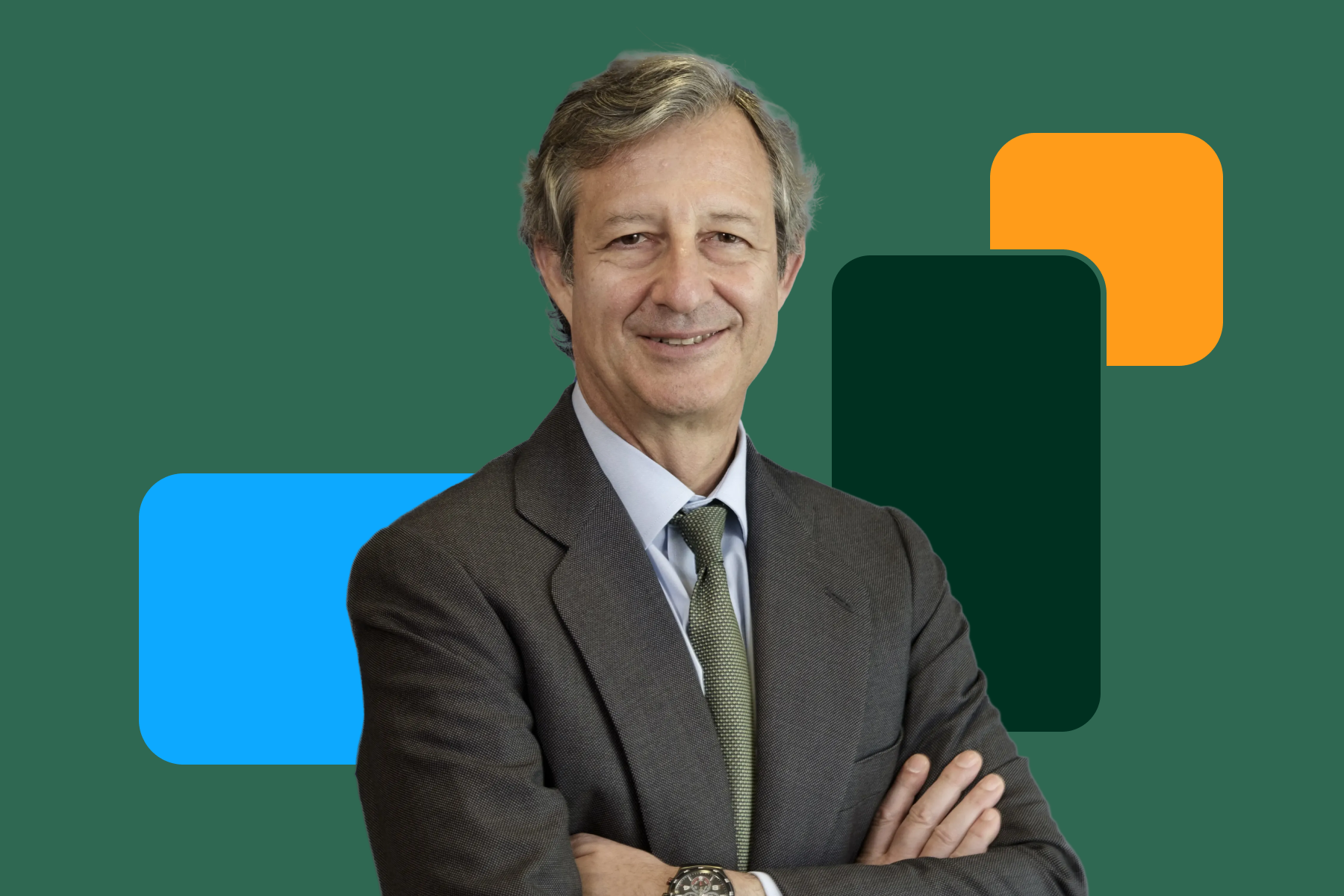 Portrait of an executive in suit with arms crossed on a neutral white and green background.